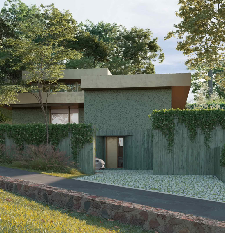 I nuovi volumi superiori rivestiti in graniglia reinterpretano il linguaggio architettonico della villa in chiave contemporanea.