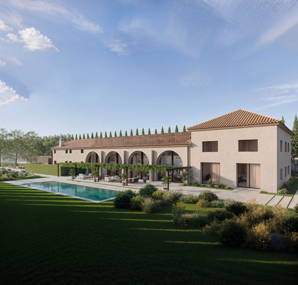 La piscina panoramica del resort, progettata come elemento contemporaneo che dialoga con la tradizione del complesso rurale, circondata da spazi di accoglienza e lettini per gli ospiti.