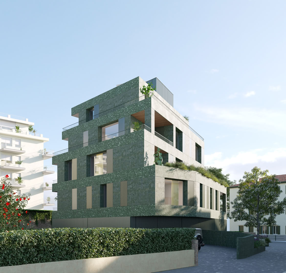 Vista esterna del nuovo edificio residenziale a Treviso vicino al fiume Sile, con facciata contemporanea e terrazzi privati.